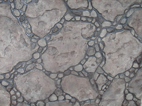 thin-stamped concrete overlay Austin