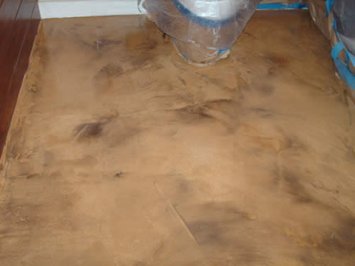 concrete overlay burnished with color